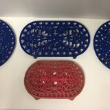 Set of four enameled cast iron trivets retro design vintage art