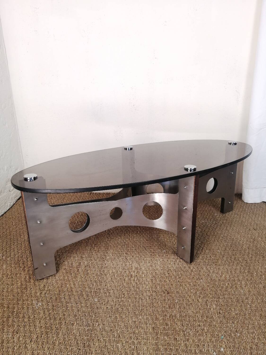Vintage design coffee table in brushed aluminum and glass top.