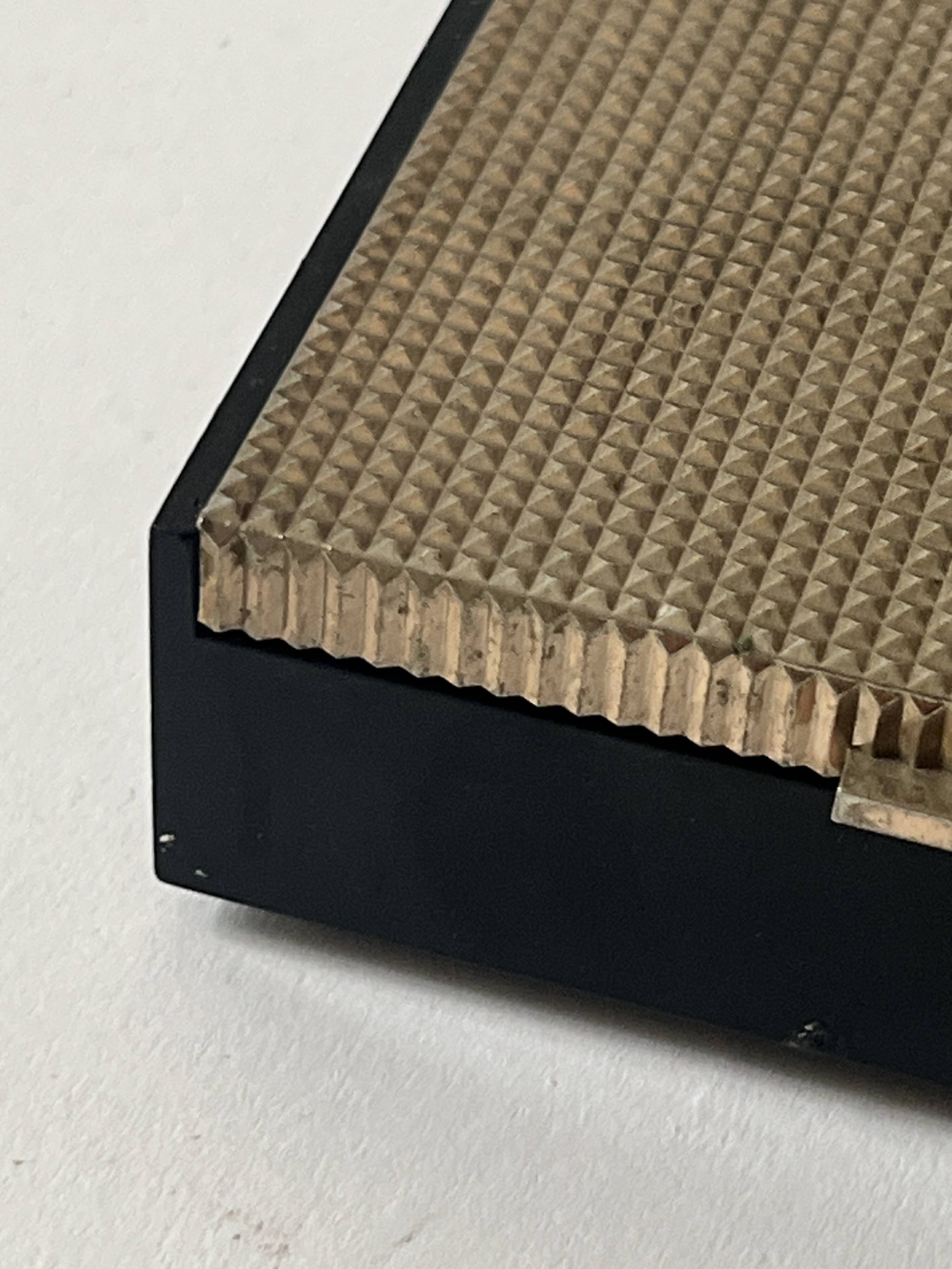 Bakelite and brass pocket emptier, 1970s design