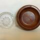 Wooden ashtray with removable glass.