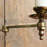 Articulated brass floor lamp