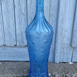 Blue glass decanter with a moon star motif