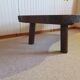 Tripod coffee table - solid okoumé wood - organic shape - brutalist style