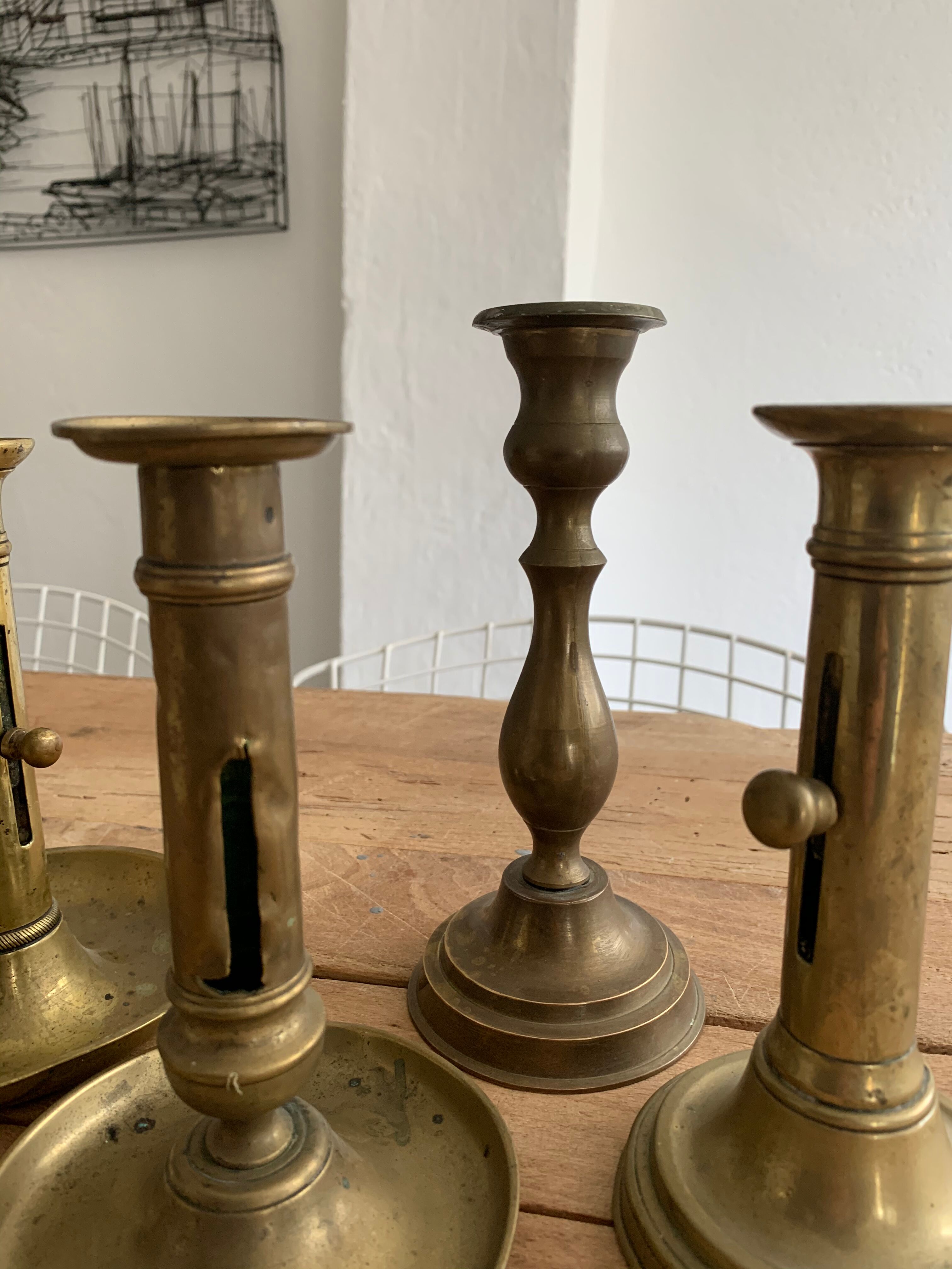 Set 4 vintage brass candlesticks patinated