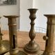 Set 4 vintage brass candlesticks patinated