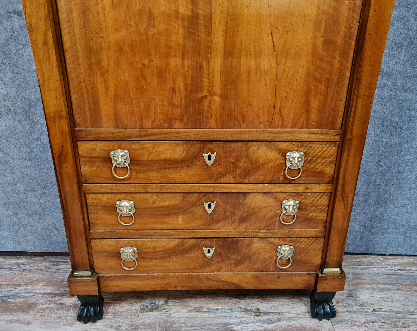 Secretary empire era with caryatid in blond mahogany around 1810