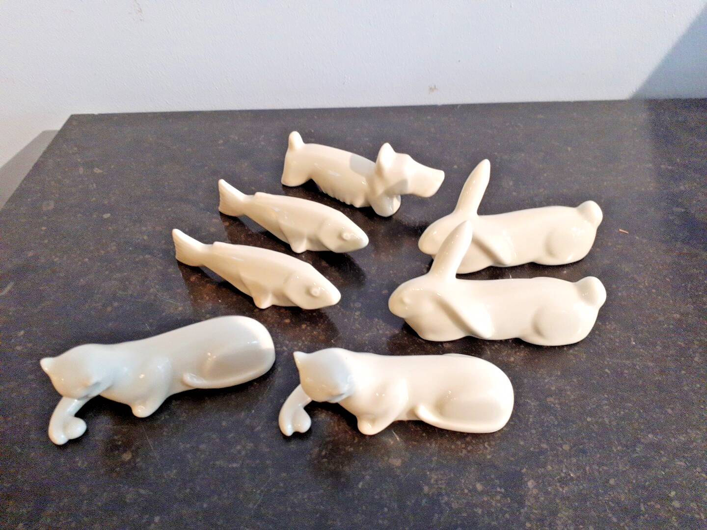 Set of 7 porcelain knife rests, animals, dog, cats, fish, rabbit.