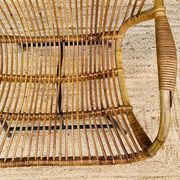 Fauteuil en rotin et piétement en métal noir 1960
