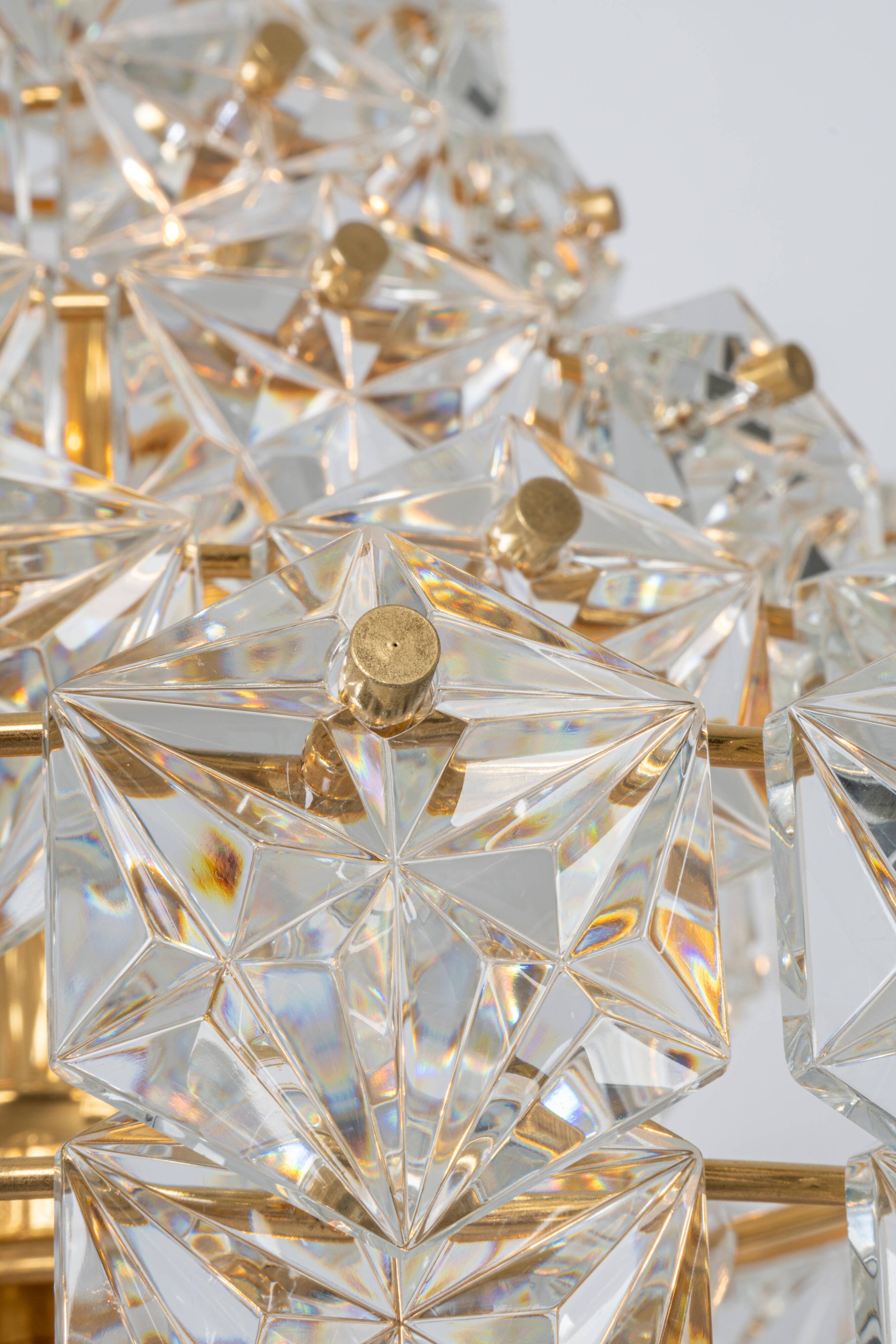 Chandelier, brass and crystal glass by Kinkeldey, Germany, 1970s.