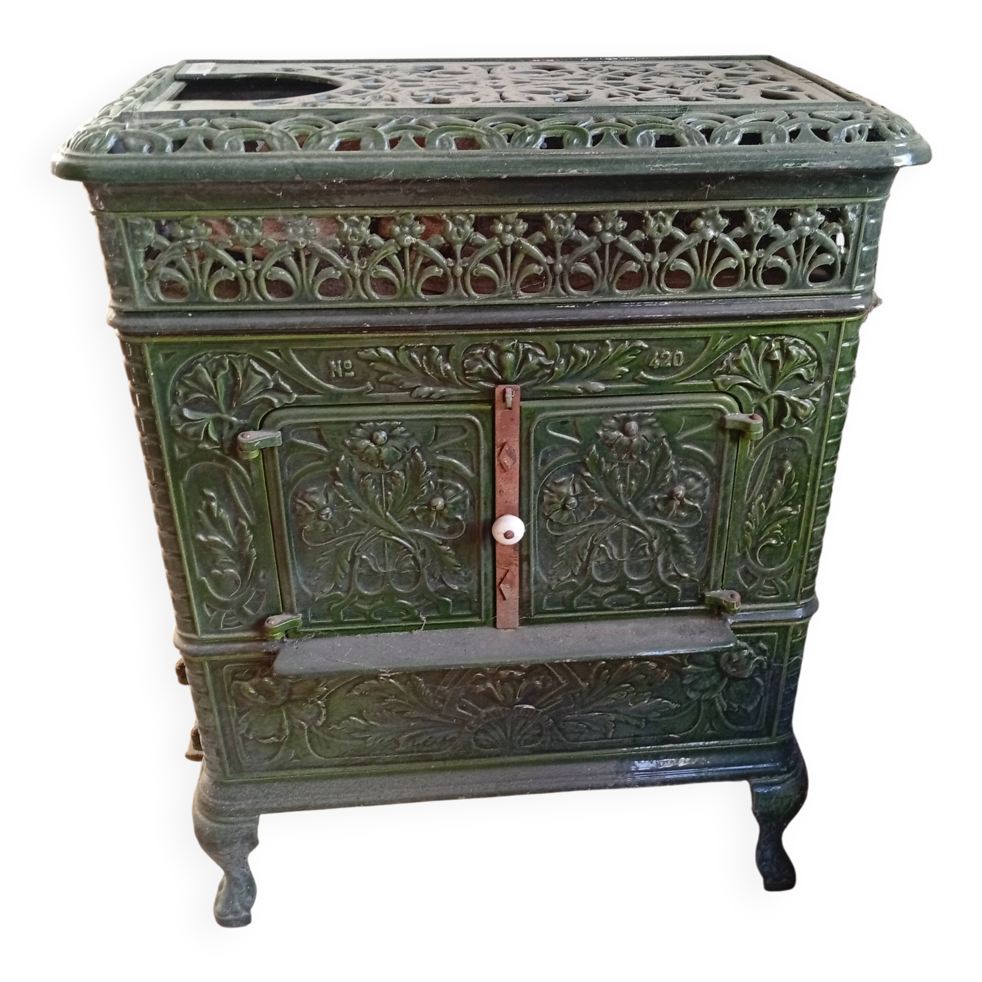 Old green enamelled cast iron stove