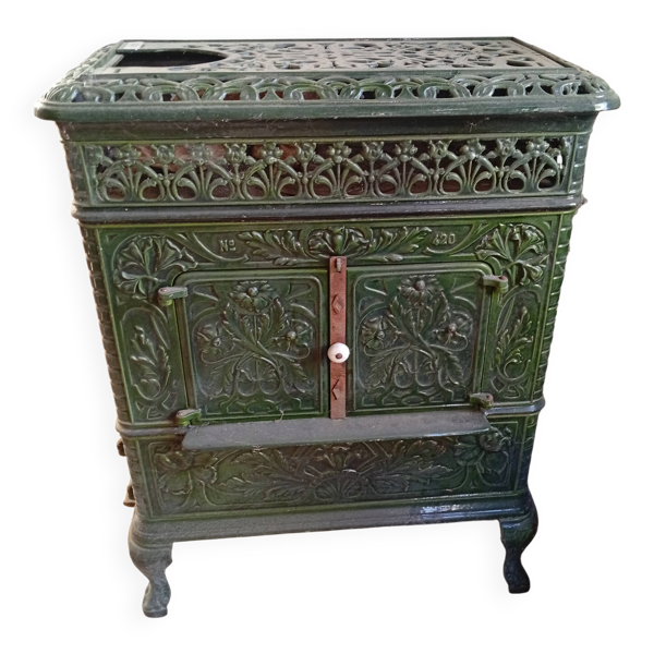 Poêle en fonte émaillée verte ancien