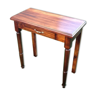 Old mahogany wooden console table and oak drawer opening