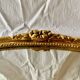 Antique oval wall mirror in gold resin - 63 cm
