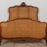 Louis XV style bed in carved and caned beech