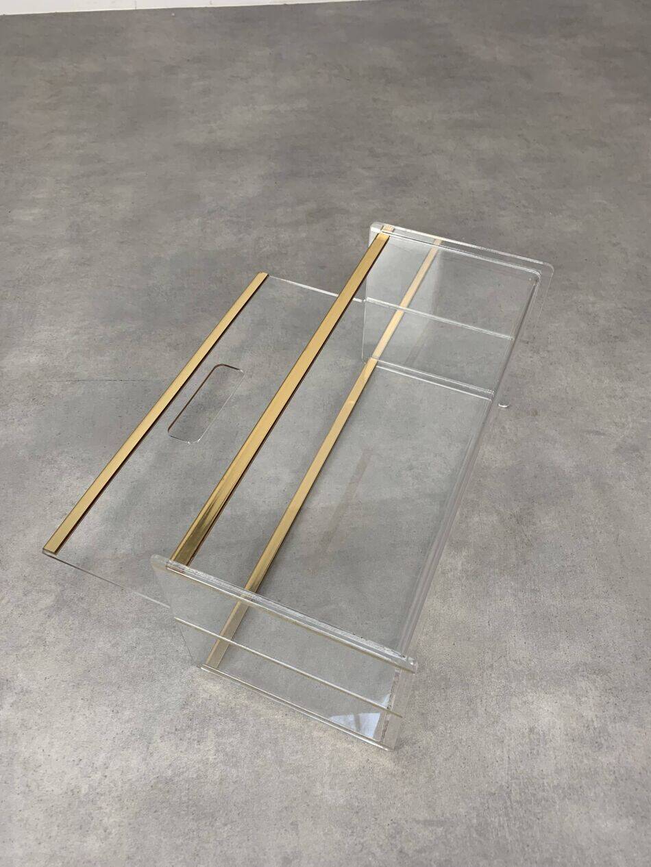 Plexiglass and brass magazine rack from the 70s in Hollywood Regency style.