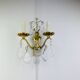 Bronze wall light with rococo style Louis XV pendants.