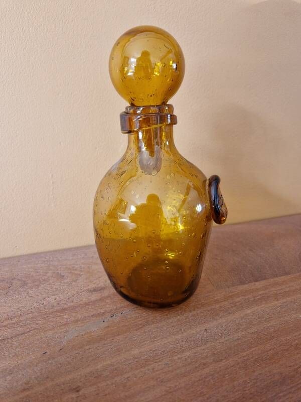 Biot perfume bottle or bubbled glass bottle in amber colour, 1970s design.
