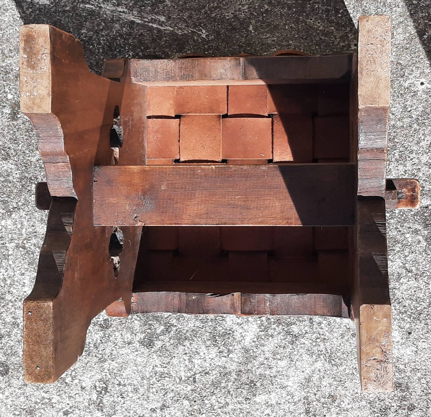 Pair of brutalist stools, leather seat.