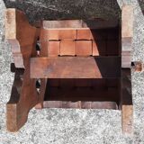 Pair of brutalist stools, leather seat.
