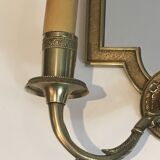 Pair of mirror and bronze wall lamps with lions' heads, french work. around 1940