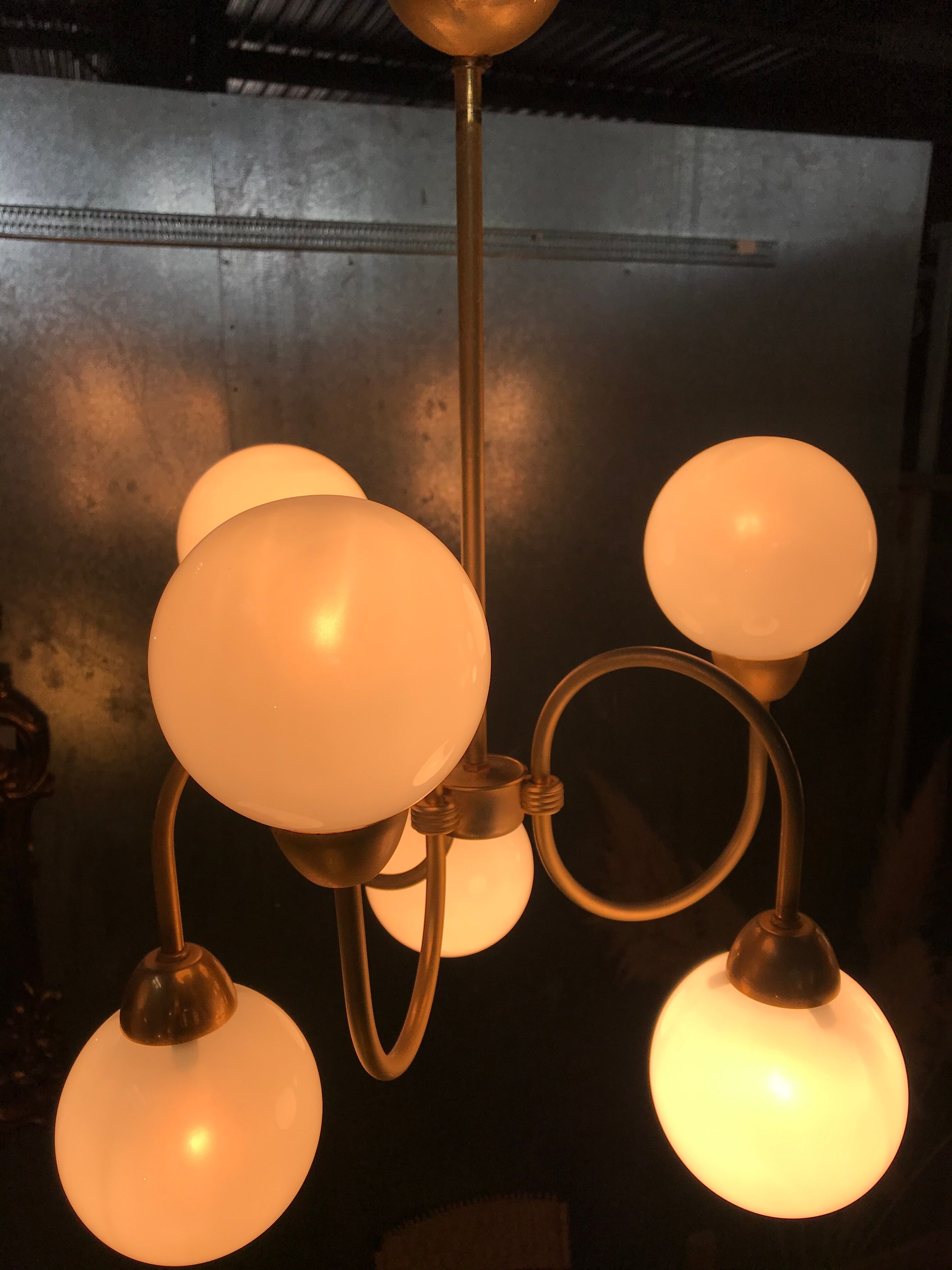 Pair of brass and opaline hanging lamps