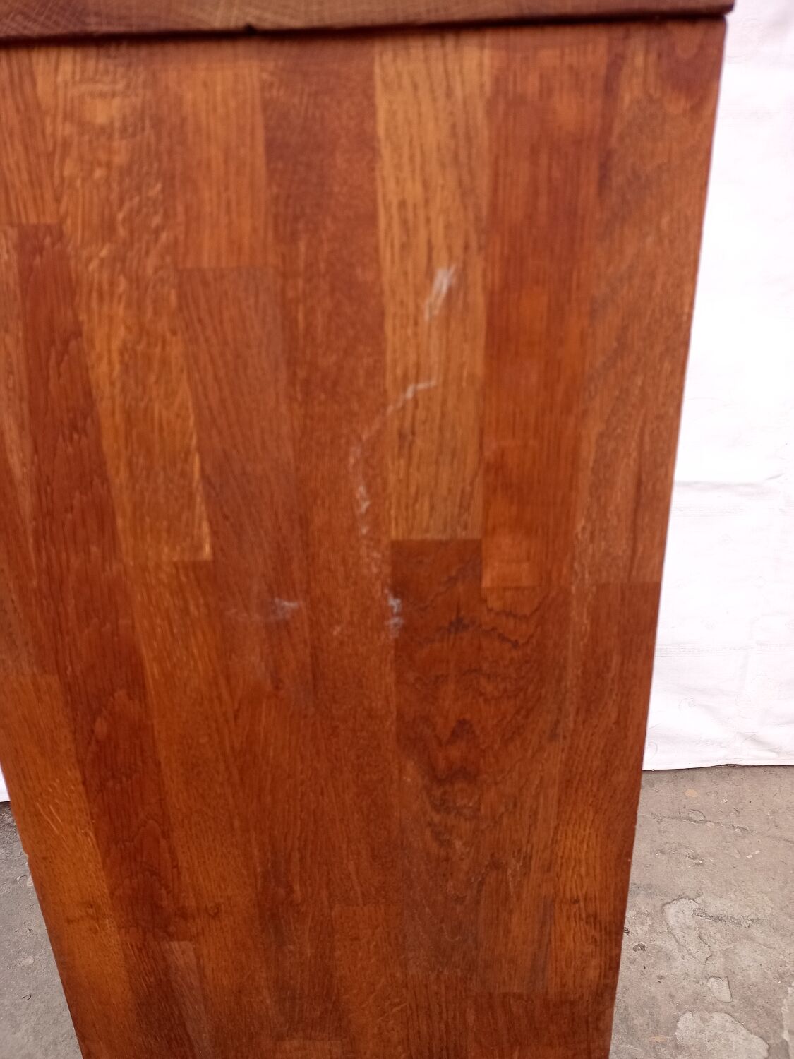 Bedside table in wooden slats