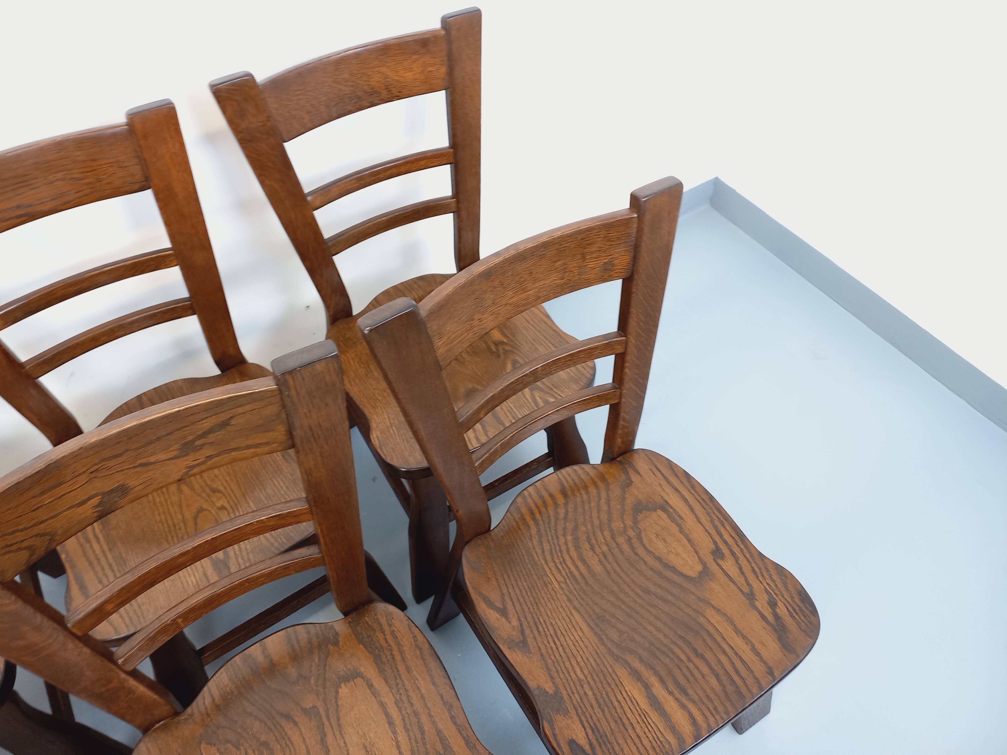 Set of 6 vintage brutalist oak chairs from the 1950s.