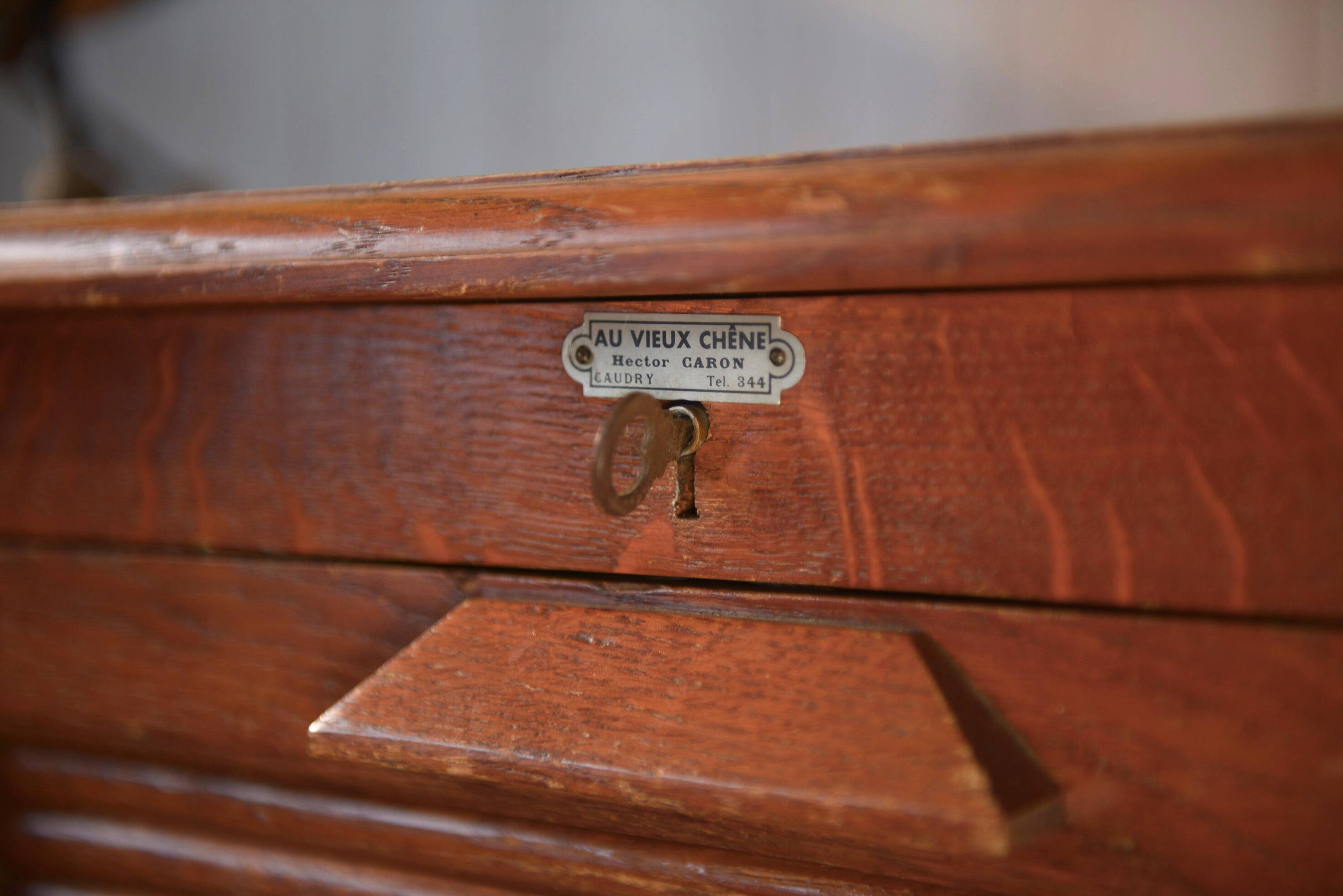 Wooden notary cabinet with shutter from the brand "Au vieux chêne" 1950's
