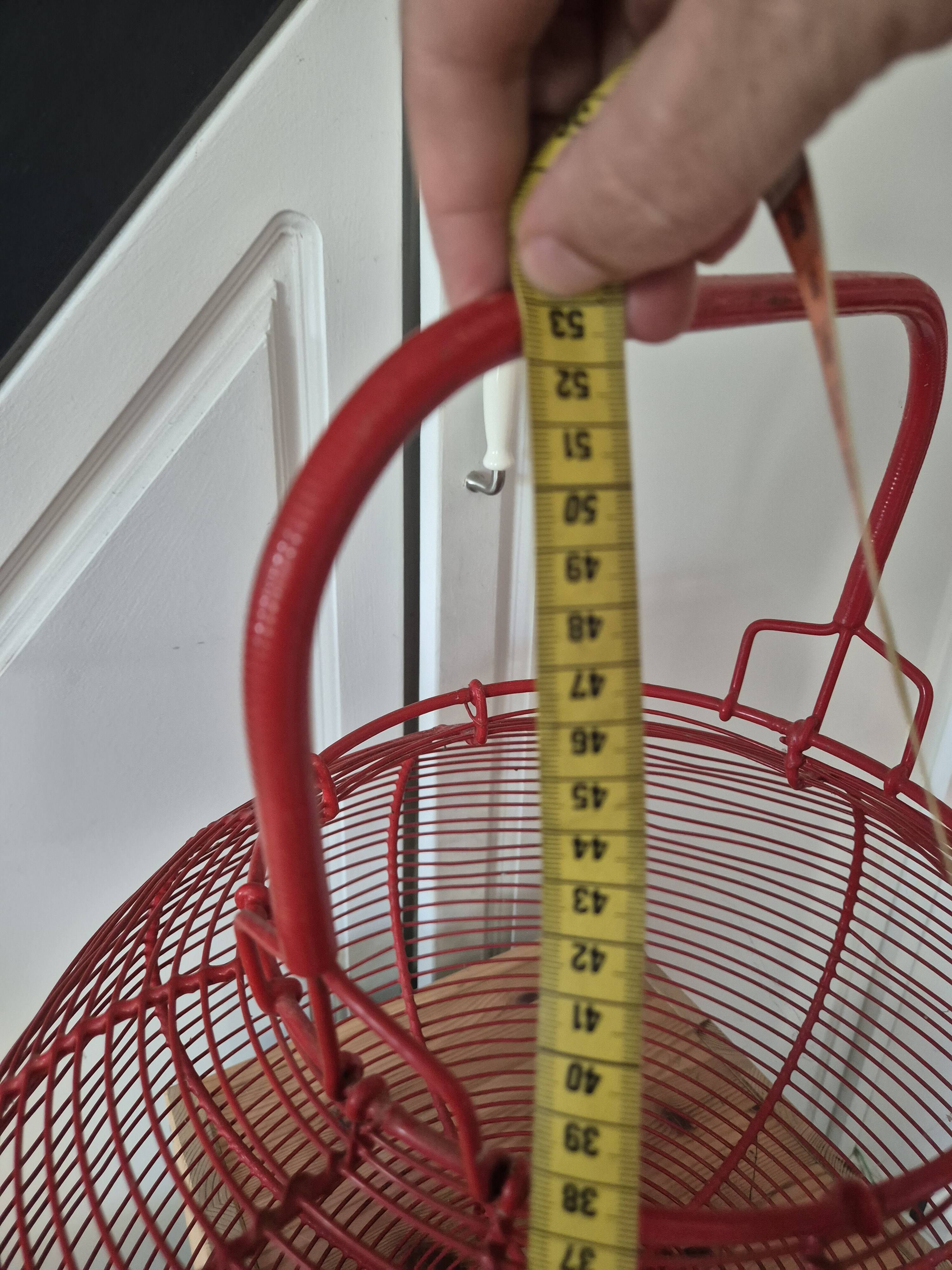 very large vintage red metal basket with handle