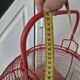 very large vintage red metal basket with handle