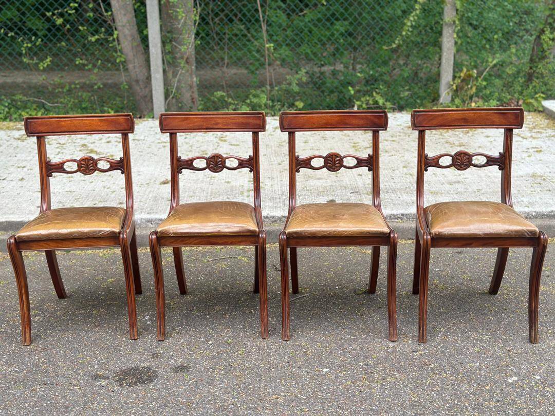 4 Regency chairs in solid wood and brown-beige leather from the 19th century.