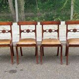 4 Regency chairs in solid wood and brown-beige leather from the 19th century.