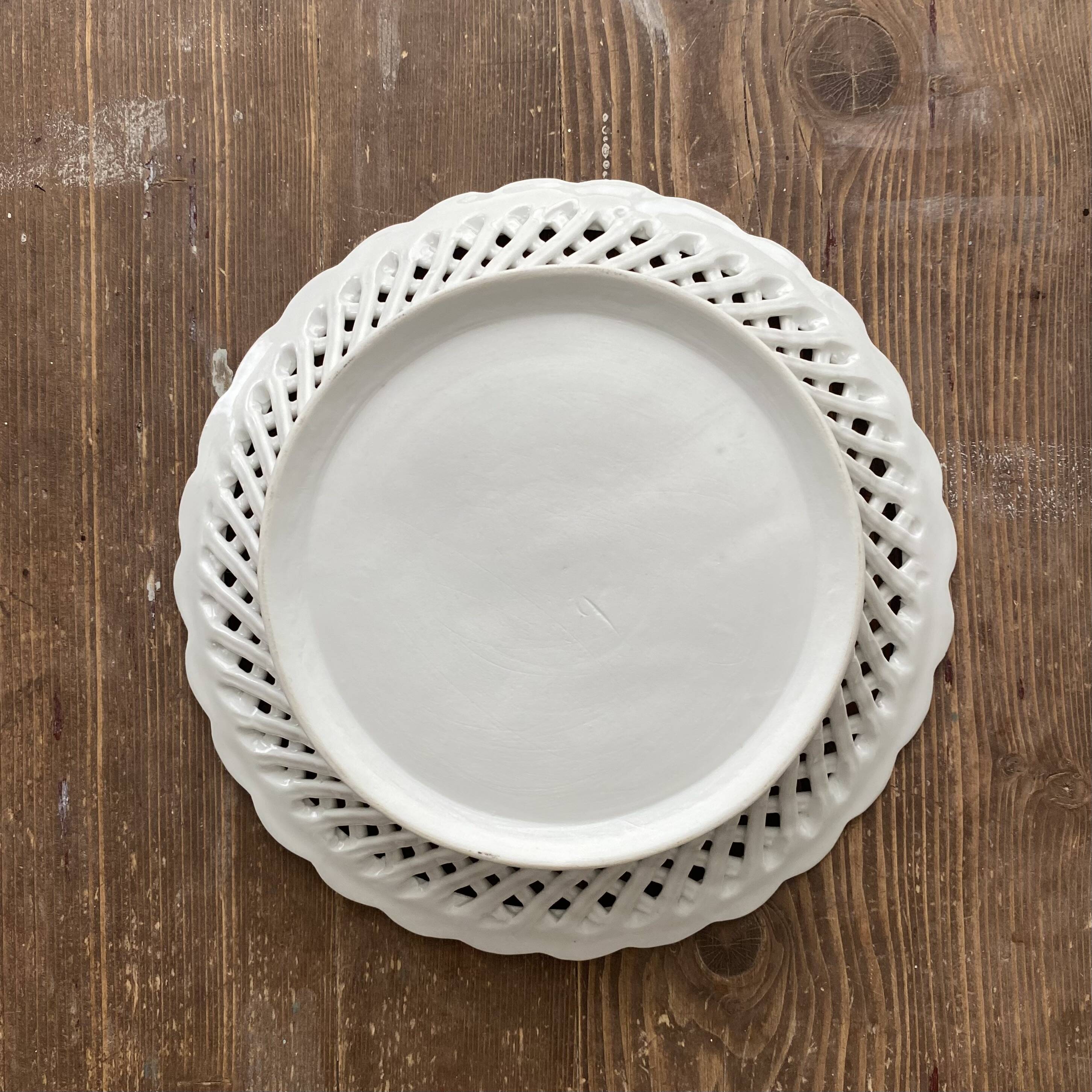 Openwork, woven earthenware plate