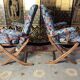 Pair of poly comfort armchairs and 1 footrest