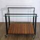 Modernist sideboard in metal, wood, and glass 1960