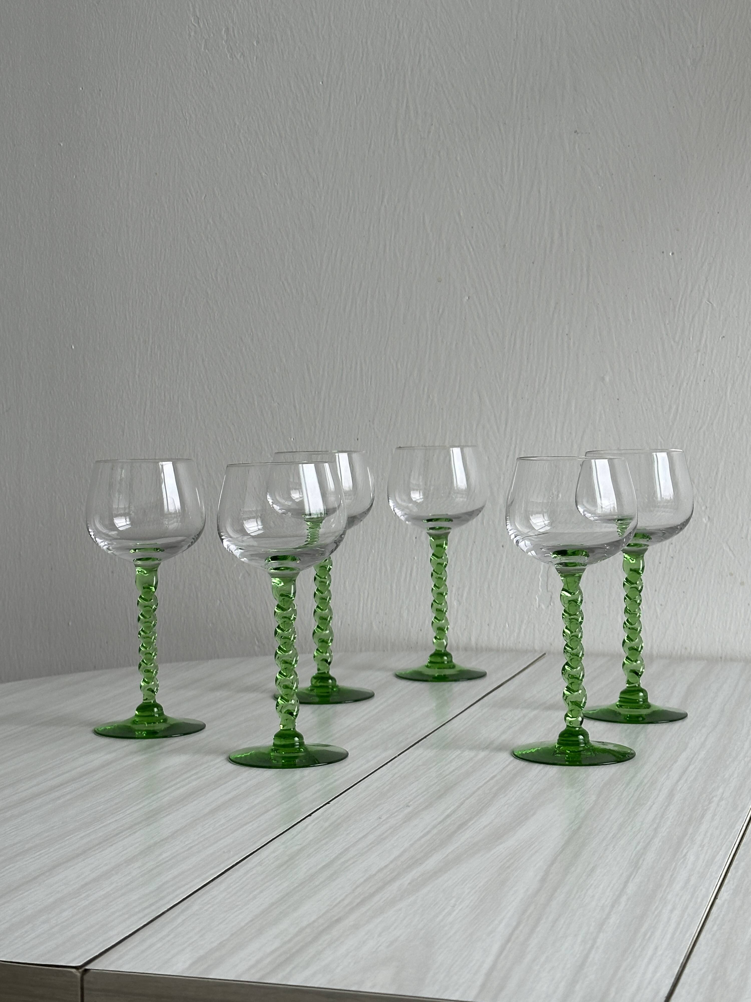 6 transparent green twisted stemmed glasses