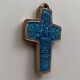 Ceramic cross with a blue background and bird decoration by Taburet Quimper, 20th century.