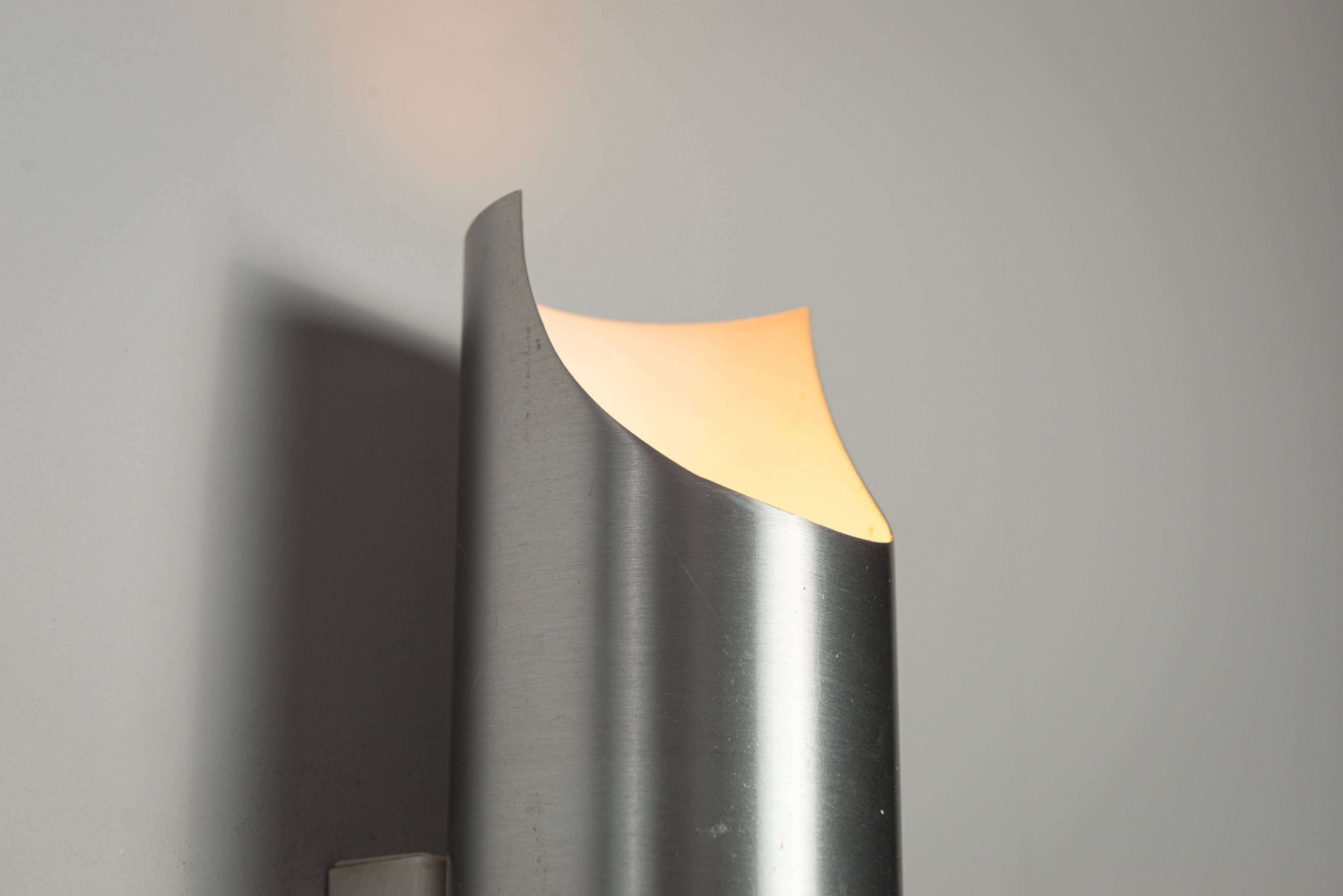 Set of three aluminium cylindrical wall lamps