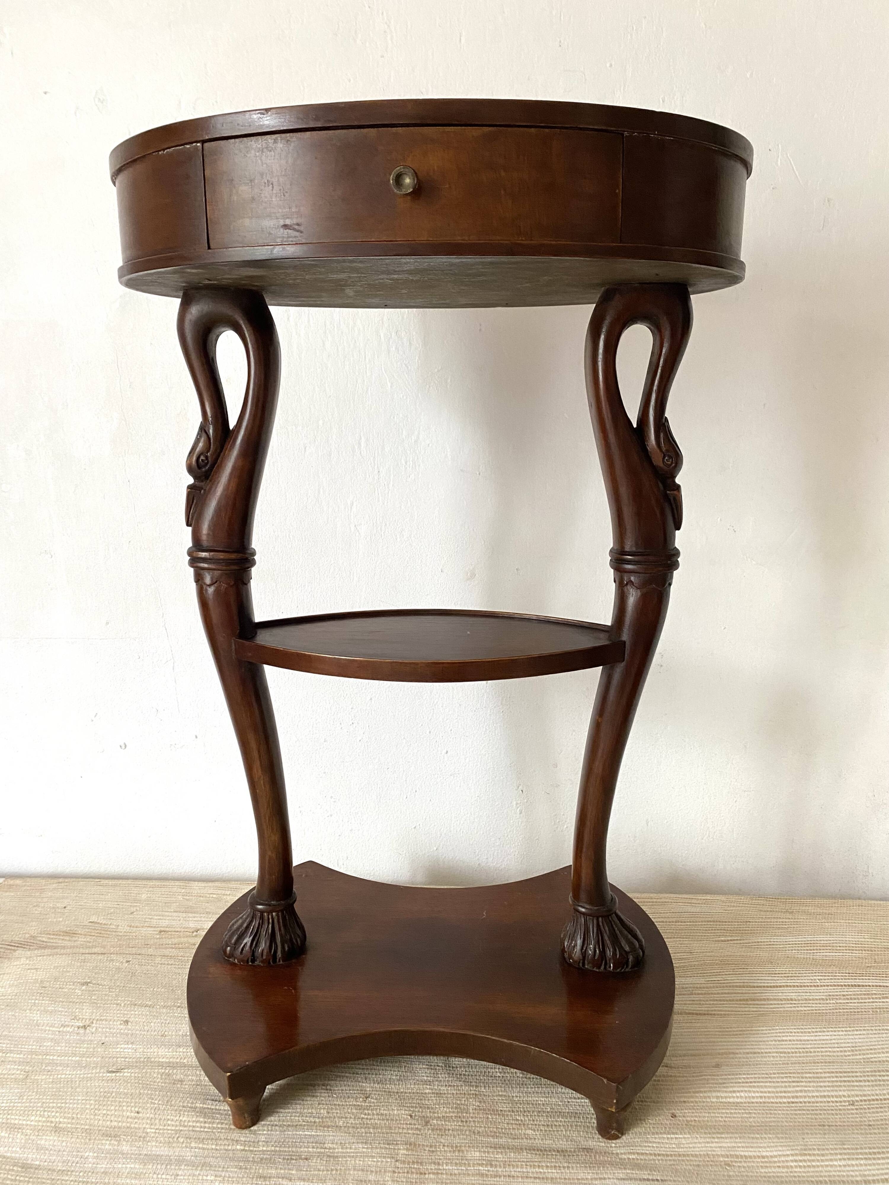Empire style swan neck and lion paw pedestal table