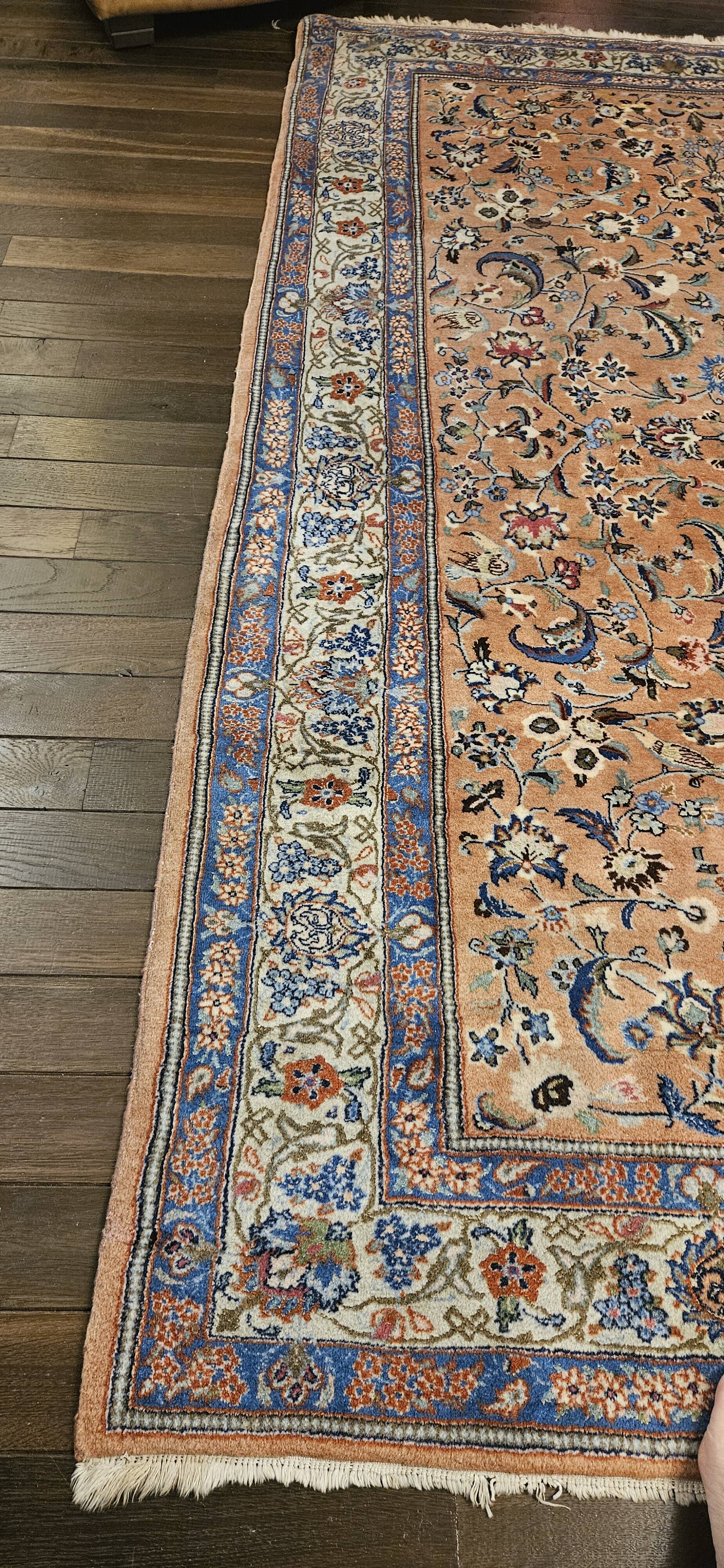 Large wool and silk oriental carpet.