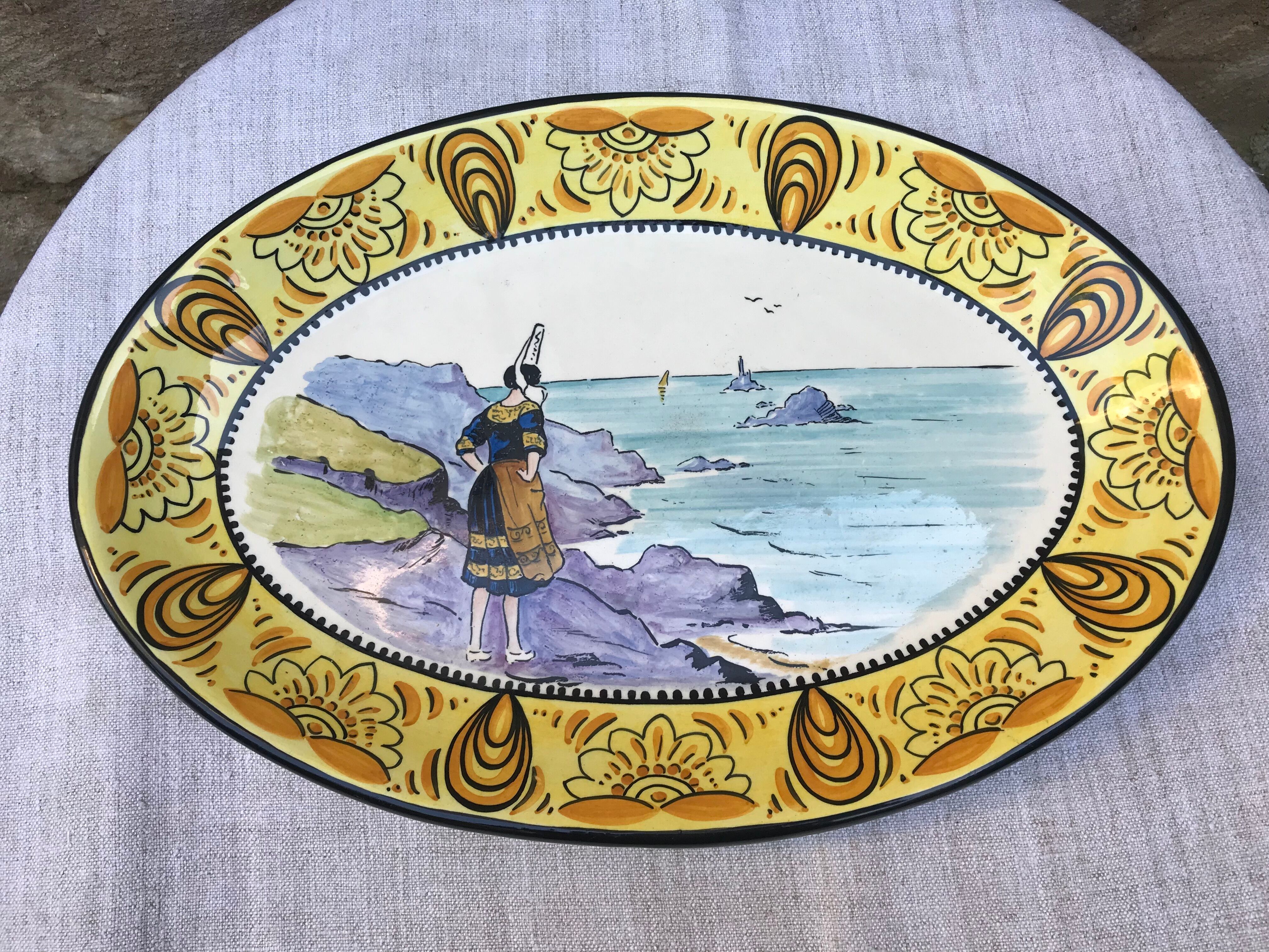 Old faience dish, Scéne Bretonne after Louis Suire and Masse Frères