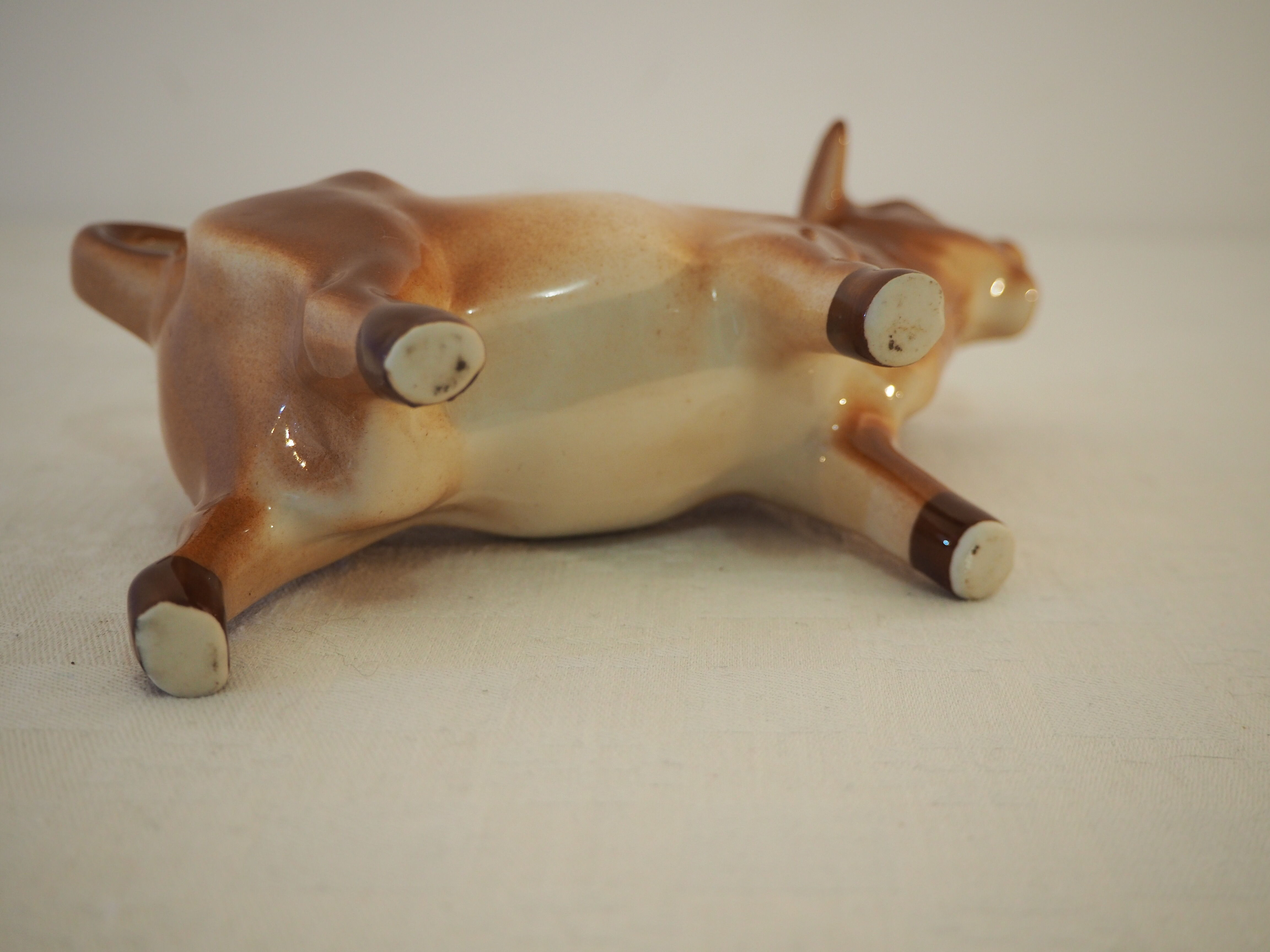 Milk jar in the shape of a vintage ceramic cow