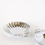 Pair of worked stainless steel shell trinket trays, 1970