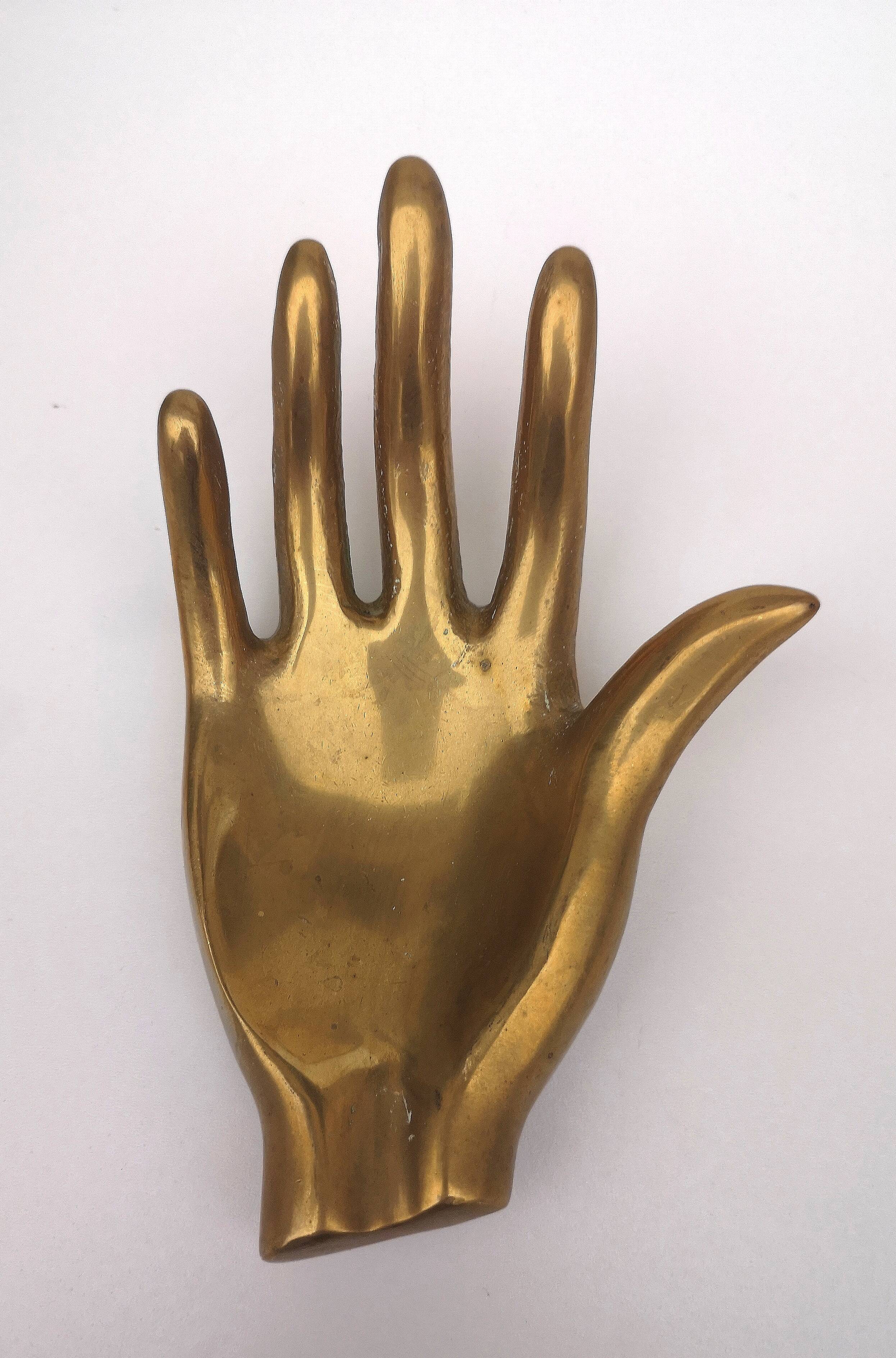Hand, vintage ashtray, bronze