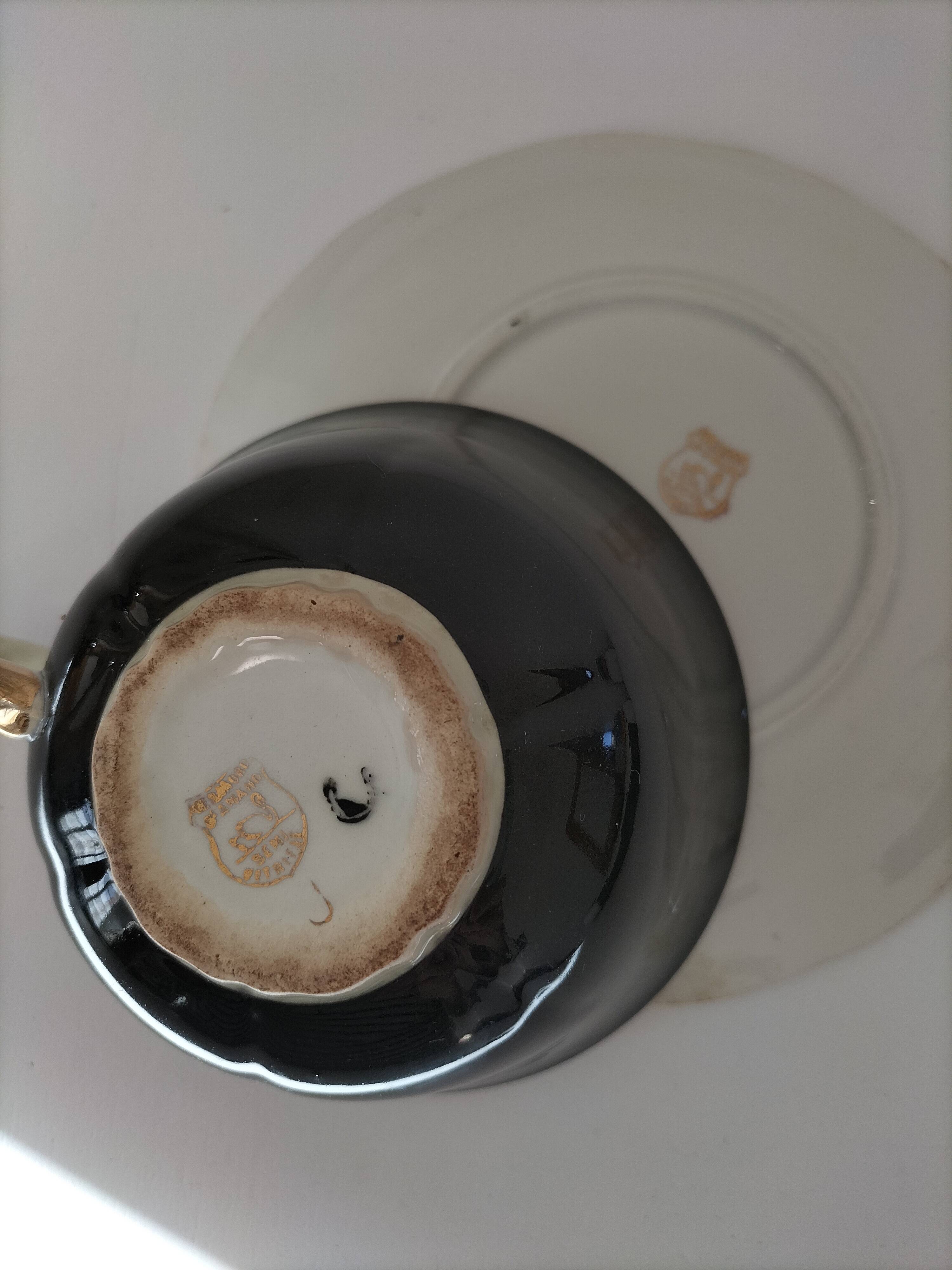 Large black, yellow iridescent and white Art Deco Saint-Amand cup.