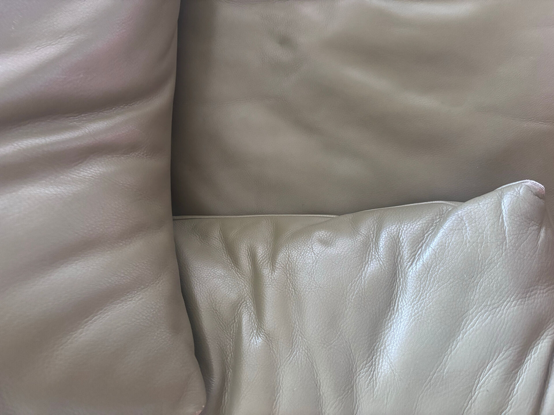 Two-seater Maralunga sofa in olive green leather.