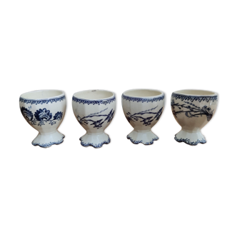 Lot of four iron earth eggcups