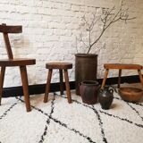 Old red and black terracotta grease pot