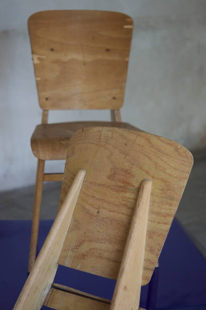 two  style wooden chairs