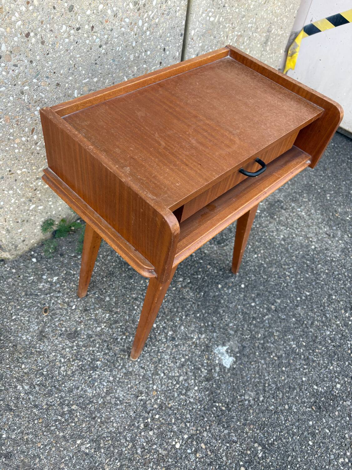 Bedside table with compass feet